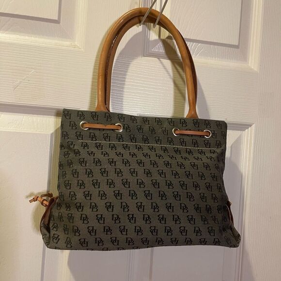 Dooney & Bourke small gray canvas logo tan leather straps and tassels.satchel. - Picture 4 of 12